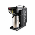 Equipo en consignación Café Koen con cafetera y dispensador sobre fondo blanco